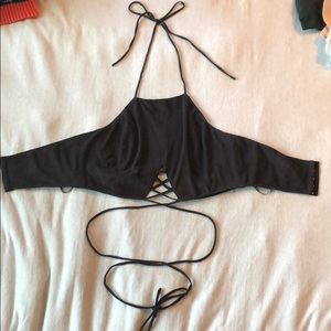 Open back, crop top shirt.